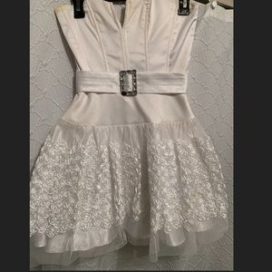 White Jessica McClintock with rosettes on bottom